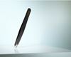 Picture of High-quality cosmetic tweezers made of black epoxy-coated stainless steel in classic design with slanted tips